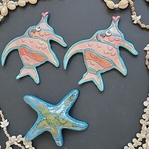 Pair of Blue Sky Clayworks Fish with matching Starfish by Heather Goldminc